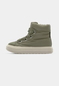 High-top sneaker in olive green nylon with padded ankle, lace-up front, and light-colored rubber sole featuring horizontal grooves.