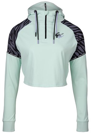 Sweat-shirt court en vert menthe avec des manches à motifs zèbre noir et gris. Il est doté d'une fermeture éclair quart de tour, d'une capuche à cordon de serrage et d'accents de logo.