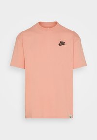 Nike Sportswear Triko s potiskem - red