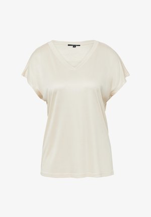 Beżowa koszulka z krótkim rękawem i dekoltem w kształcie litery V, wykonana z miękkiej, gładkiej tkaniny. Posiada luźny krój oraz subtelne detale przeszycia wzdłuż dolnej krawędzi.