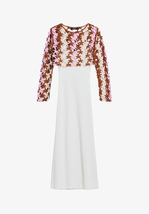 White floor-length dress with long sleeves. The top features a brown and pink floral lace overlay, adding texture and pattern contrast.
