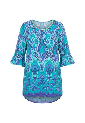 Modrá a tyrkysová vzorovaná blůza s dlouhým rukávem, kulatým výstřihem a rozšířenými manžetami, s abstraktním ornamentálním vzorem.