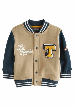 Brun og marineblå baseballjakke med ribbestrikket krave og manchetter, med "Los Angeles" broderet i hvid samt et gult "T" patch.