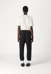 DRYKORN LIROG - Chinos - black