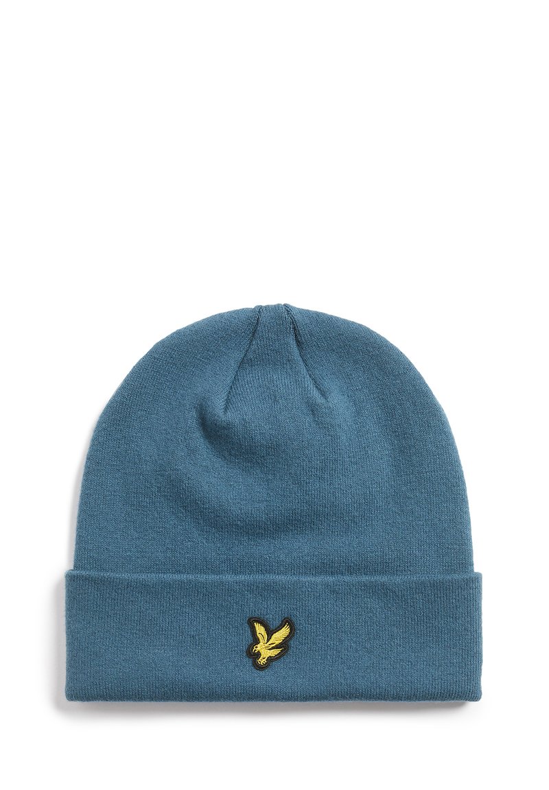 Bonnet en tricot de couleur bleu doux avec un revers replié. Présente un petit logo doré brodé d'un oiseau sur le devant.