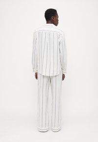 GAP Pidžaamakomplekt - ivory/black