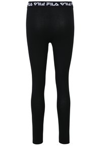 Leggings neri con un design aderente, realizzati in tessuto elasticizzato. Presentano una vita elastica bianca con il logo "FILA" ripetuto.