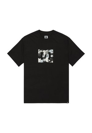 T-shirt nera in cotone, con un logo grigio e bianco sfrangiato sul davanti, maniche corte e collo a giro.
