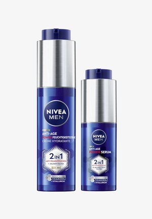 Two blue and silver Nivea Men skincare bottles, labeled Anti-Age Power 2-in-1 cream and serum with Thiamidol and Hyaluron.