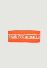 Narančna pletena ušesna traka z belim logotipom "Peak Performance". Ima široko, elastično zasnovo za udobje in prileganje. Gladka tekstura.