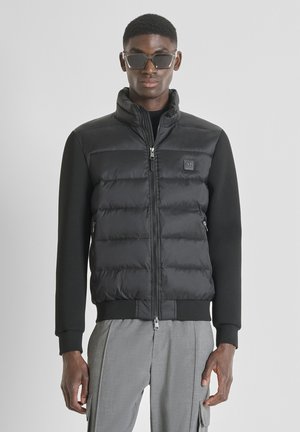 WITH STRETCH SLEEVES - Light jacket - black