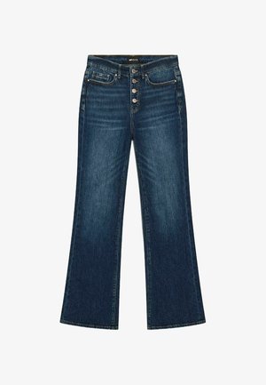 Pantalones vaqueros de pierna ancha en azul oscuro con cierre de botones, cinco bolsillos y un sutil desvanecimiento a lo largo de las piernas.