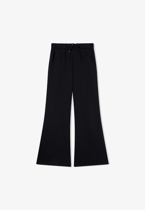 Pantaloni larghi neri con cintura elastica regolabile, tasche laterali e una superficie in tessuto morbido.