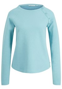 Light blue long-sleeve top with a rounded neckline, raglan sleeves, and button accents on one shoulder. Made from a soft, textured fabric.