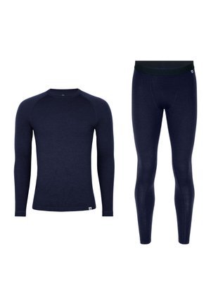 Haut à manches longues bleu marine et leggings assortis en tissu doux et texturé. Comprend un col rond et une ceinture élastique sur les leggings.