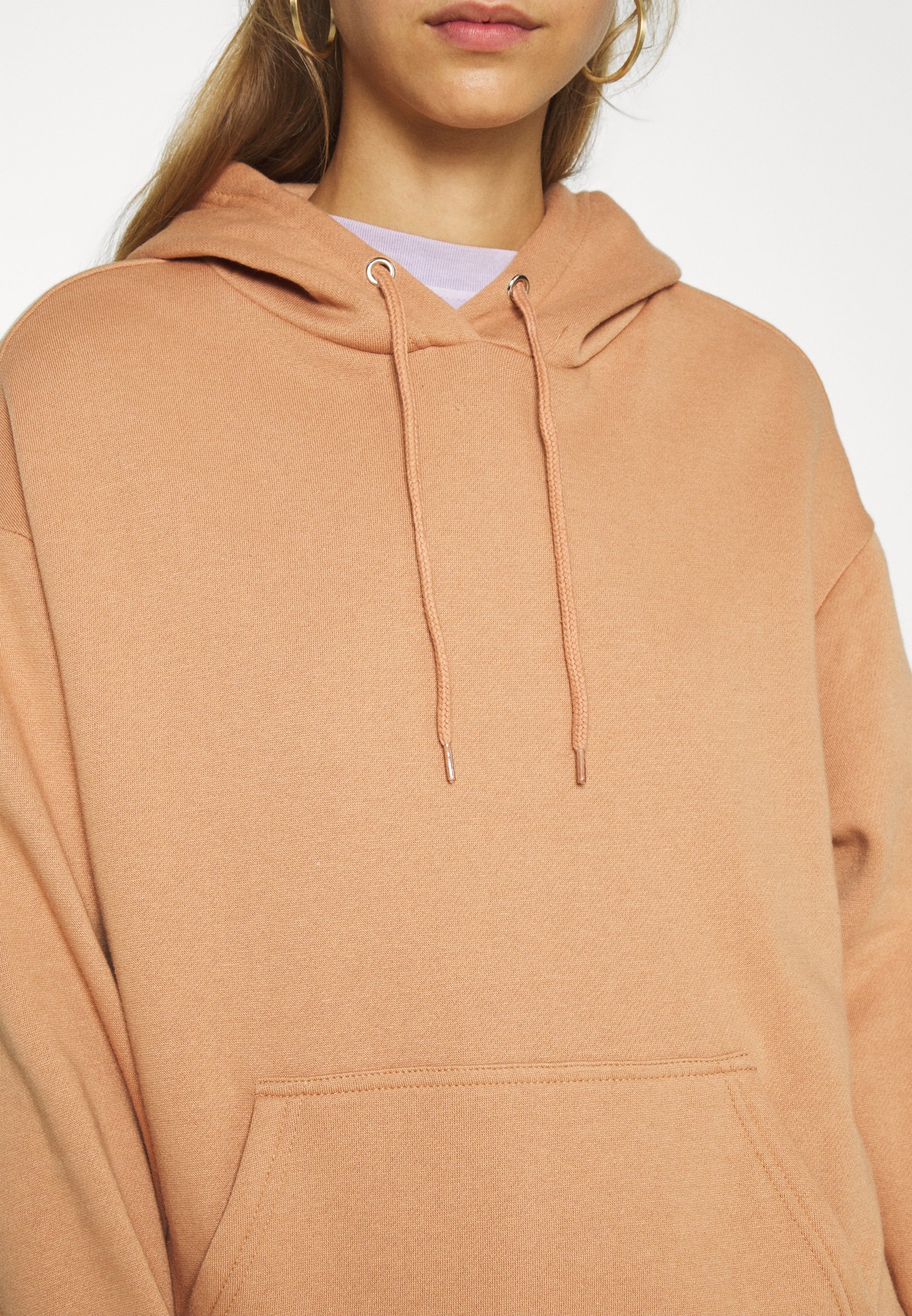 light tan sweatshirt