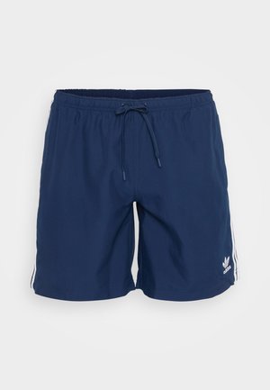 Mörkblå badshorts i lätt tyg, med dragsko i midjan, sidostråk och en liten vit logotyp på nederdelen fram.