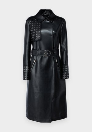 Black leather coat with a collar, studded panel on one shoulder, zippered pockets, and a matching belt with a unique buckle.
