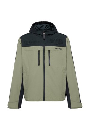 Light green jacket with a black hood and shoulders, featuring zippered pockets and textured branding across the chest.