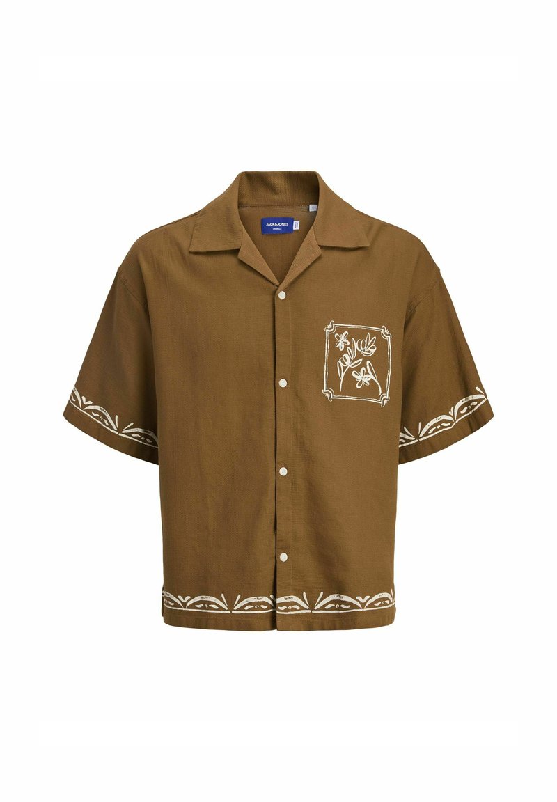 Chemise marron à manches courtes avec un devant à boutons. Dotée d'une broderie florale blanche sur la poche poitrine gauche et dans l'ourlet inférieur. Texture de tissu douce.