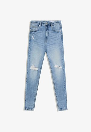 Lichtblauwe skinny jeans met versleten plekken op beide knieën, voorzakken en een knoopsluiting.