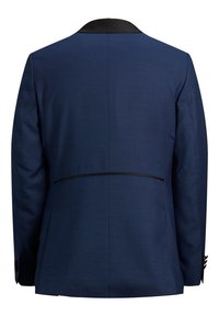 Marinblå kostymjacka med svart krage, skräddarsydd passform, texturerad tyg och en ensam ventil bak. Har svarta detaljer vid sömmarna.