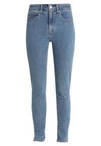 Jeans skinny de mezclilla de lavado claro que presentan un diseño ajustado, bolsillos frontales, cremallera y el clásico estilo de cinco bolsillos.