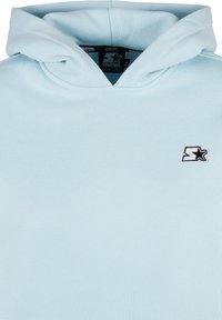 Light blue hooded sweatshirt made of soft fabric, featuring a black embroidered logo on the left chest and a kangaroo pocket.