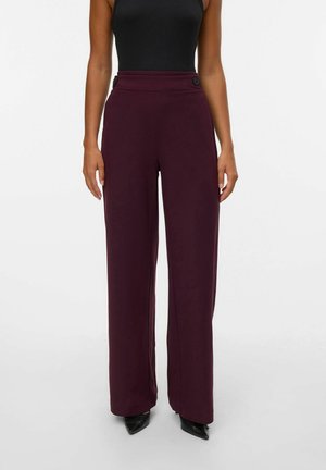 Wide-leg trousers in dark burgundy fabric; features a high waistband with two black buttons, smooth texture, and floor-length design.