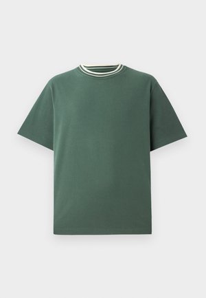 Green cotton t-shirt with short sleeves and a ribbed crew neckline featuring white and dark green stripes. Straight hem, minimal design.