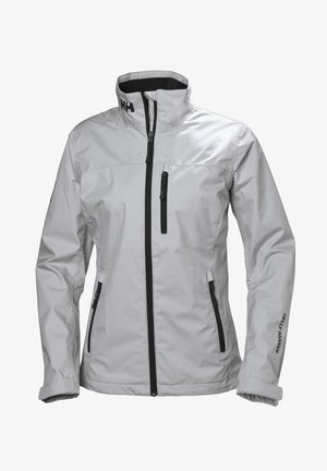 Lichtgrijze waterdichte jas met een hoge kraag, zwarte ritsen en zakken. Voorzien van een logo op de kraag en mouw. Glad, duurzaam materiaal.
