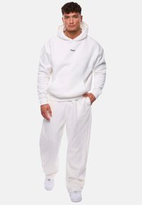 Dropsize OPEN LEG - Joggebukse - creamwhite