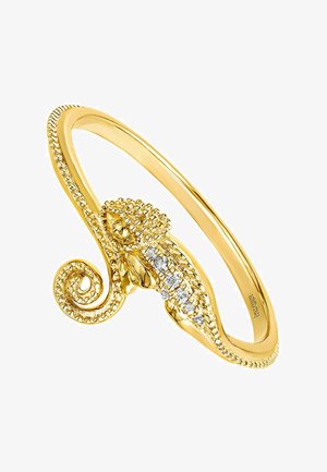 Pulsera de pulpo en tono dorado con detalles texturizados, piedras preciosas claras y un diseño en espiral en un extremo. Acabado suave con intrincados acentos.