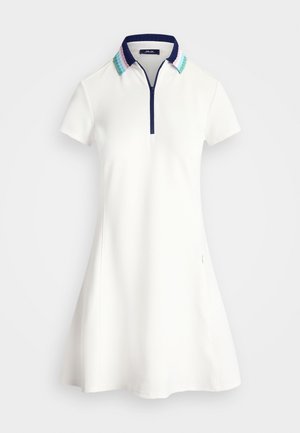 Vestido polo blanco con un cuello con cremallera que presenta una banda texturizada en navy y acentos a rayas en colores pastel. Mangas cortas y dobladillo acampanado.