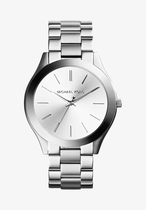 Silver-tone metal watch with a sleek, round case, a polished, reflective dial, and minimalist hour markers. Features a bracelet-style band.