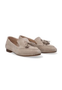 Wildleder-Loafer in hellem Beige, mit abgerundetem Zehenbereich, dekorativen Quasten, gestickten Verzierungen und einem niedrigen Holzabsatz.