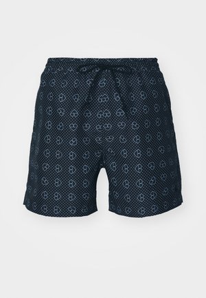 Shorts de bain bleu marine à pois blancs et motifs de cœurs, dotés d'une taille élastique avec un cordon de serrage pour un ajustement réglable.