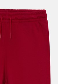 Jordan STRETCH PANT UNISEX - Παντελόνι φόρμας - red