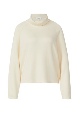 Maglia a collo alto a maniche lunghe color crema con vestibilità comoda e maniche raglan, mostrata su sfondo bianco.