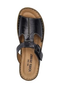 Sandal in pelle nera con punta aperta, due sezioni ritagliate e una cinghia regolabile. Cuciture a contrasto e una suola di colore naturale.