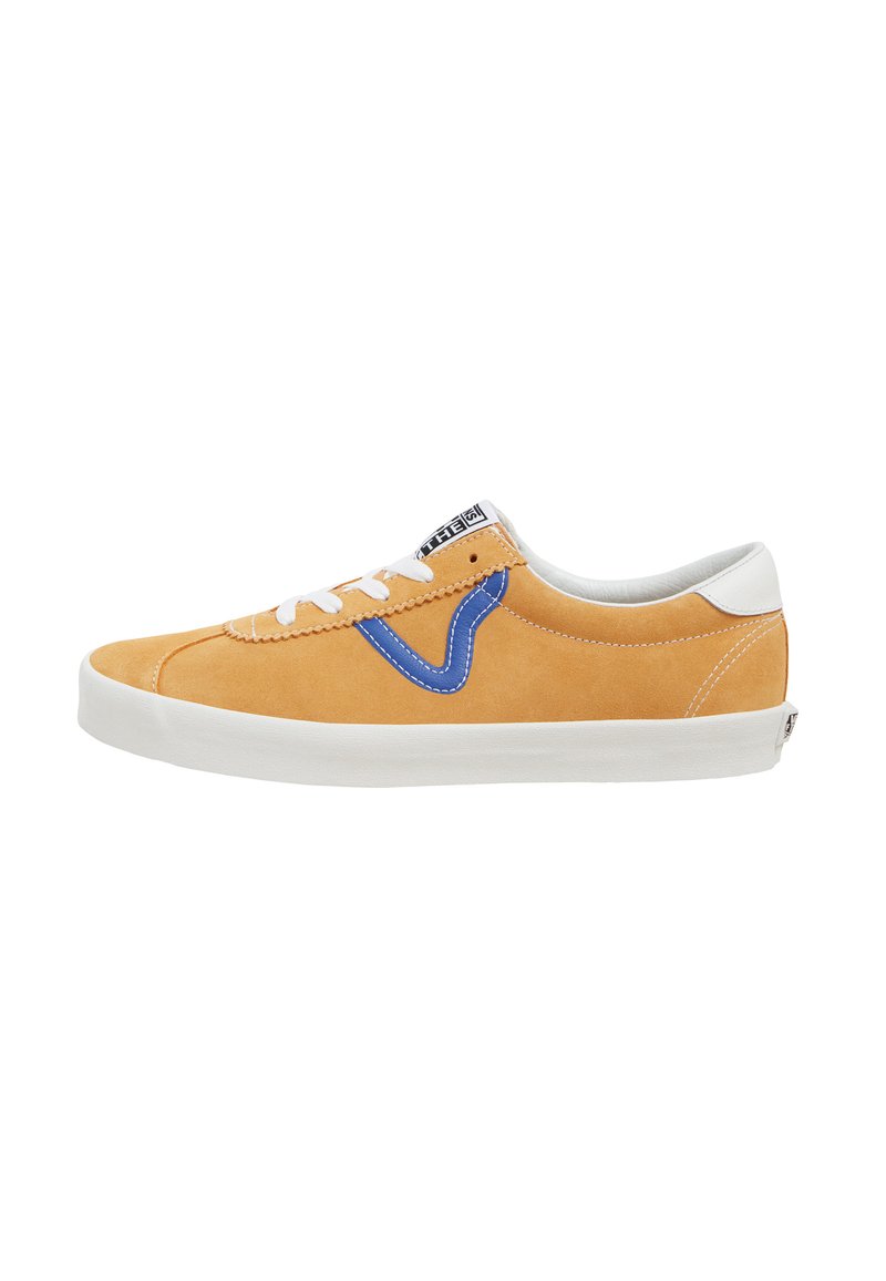 Tan suede sneaker with white laces and sole, featuring a blue accent on the side and a black label on the tongue.
