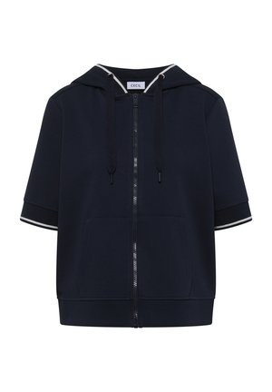 Sweat à capuche zippé à manches courtes bleu marine avec poches avant, cordons noirs et bordure blanche sur le bord de la capuche et les poignets.