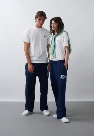 Lacoste, UNISEX - Pantalon de survêtement - navy blue