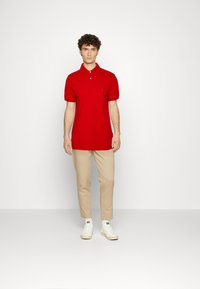 Tommy Hilfiger REGULAR - Polo - empire flame