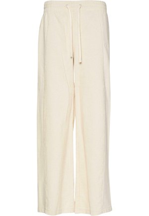 Weite Hosen in Creme, aus einem strukturierten Stoff mit einem gerippten Muster. Verfügt über einen elastischen Bund und einen Kordelzug zur Anpassung.