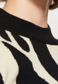 Object Trui - black