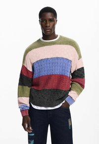 Knit sweater with a textured design in green, pink, blue, red, and black stripes. Features a crew neckline and ribbed cuffs.