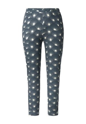 Leggings con una tela texturizada azul que presenta un patrón repetitivo de abanicos en blanco. Cintura elástica y ajuste tapered.