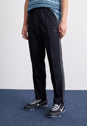 Pantalones deportivos - black