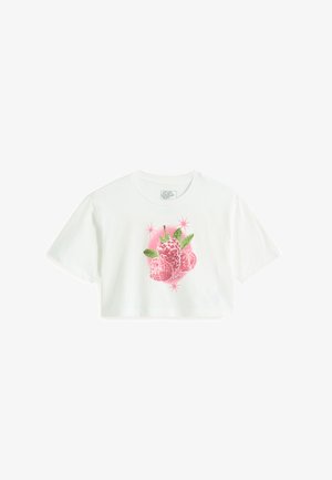 Valkoinen lyhythihainen kääntö t-paita, joka on valmistettu puuvillasta. Kankaassa on keskellä pinkki hedelmäkuvio, jonka ympärillä on vihreitä lehtiä ja kimallusta. Lyhyet hihat.